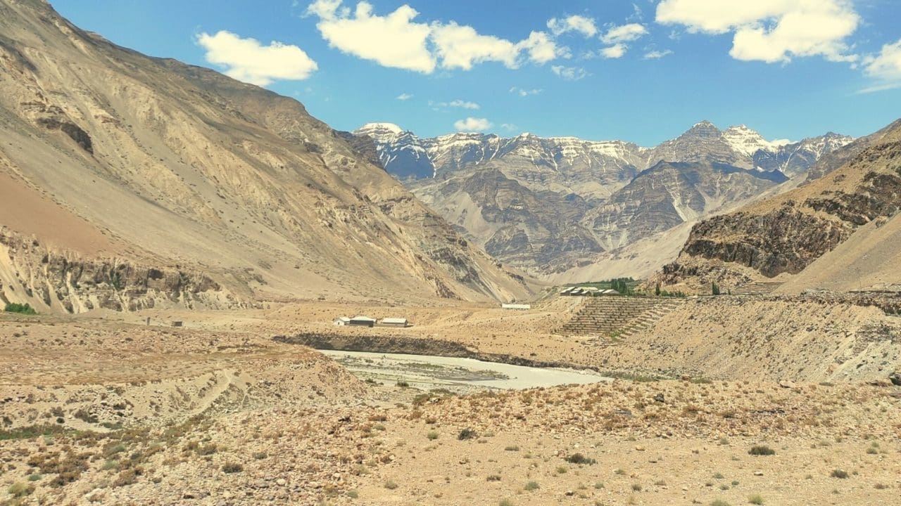this is a spiti valley. dry moutaions and blue sky litbit cloud