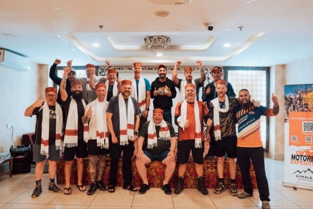 Group of motorbike riders welcomed with traditional Indian ceremony during their motorbike expedition in India, organized by Motorbike Expedition.